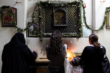 Women praying in Saint George coptic orthodox church