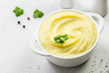 Garlic white bean mash in a bowl. Top view, copy space, flat lay.