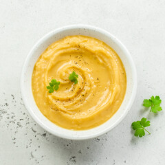 Instant pot split pea puree with herbs and olive oil. Top view, copy space, flat lay.