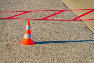 Orange traffic cone on airport