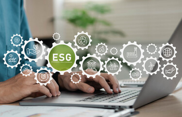 Businessman using computers for environment, society and governance. ESG icon concept in...