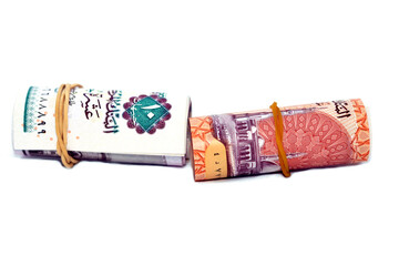 Egypt money roll of new first Egyptian 10 LE EGP ten pounds plastic polymer banknote and the old...
