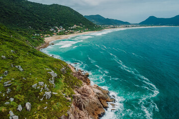 Scenic coastline with mountains and blue ocean in Brasil. Aerial view