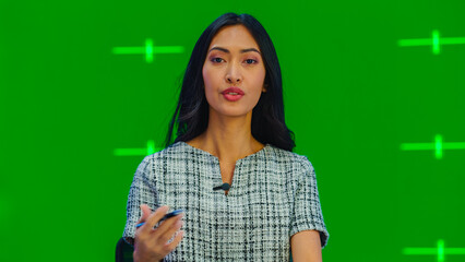 Newsroom TV Studio Live News Program with Green Screen Background: Female Presenter Reporting,...
