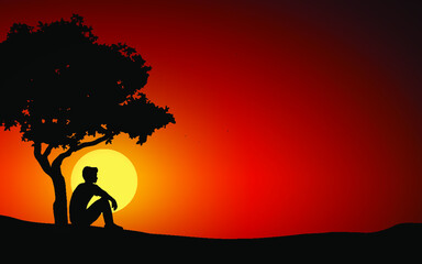silhouette of a person and a tree at sunset