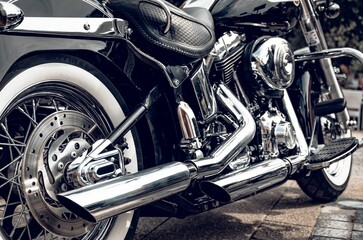 Closeup of a beautiful cruiser motorbike parked on the street.
