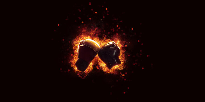 boxing gloves in fire isolated in black background isolate