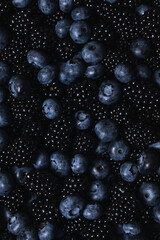 Texture photo of blackberry and blueberry close up