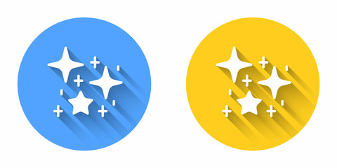 White Sparkle stars with magical glitter particles icon isolated with long shadow background. Magic christmas decoration. Circle button. Vector