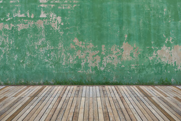 Green cement wall texture with peeling paint on the surface. For texture and background