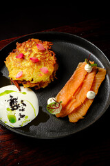 potato pancakes with salmon and sauce