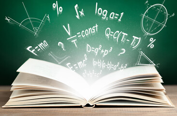 mathematical formulas in the form of digital holograms fly out of an open book, the concept of education