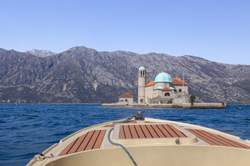 Fototapeta na wymiar The Island of Our Lady of the Rocks in the Bay of Kotor, Montenegro. Boat trip.