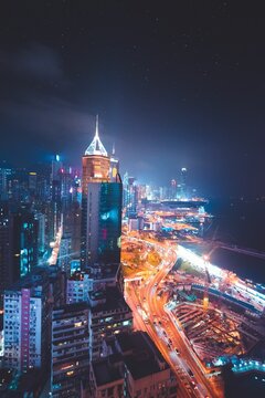 Aerial View Of The Iconic Hong Kong Skyline At Night