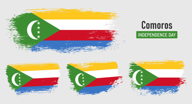 Textured collection national flag of Comoros on painted brush stroke effect with white background
