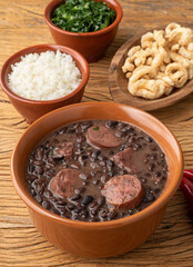 Typical brazilian feijoada with kale, rice and cracklings