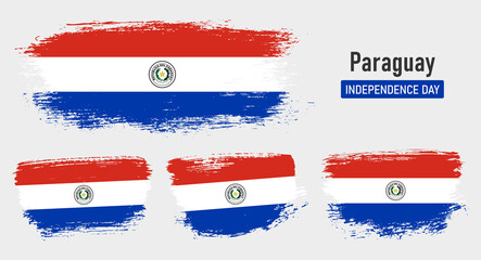 Textured collection national flag of Paraguay on painted brush stroke effect with white background