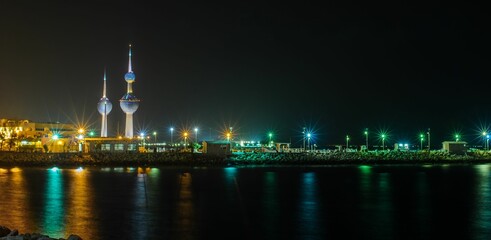 Illuminated night view of Kuwait city and famous towers