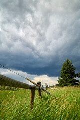 Ranchland Storm Clouds vertical. A threatening sky in rural ranch country of the Nicola Valley,...