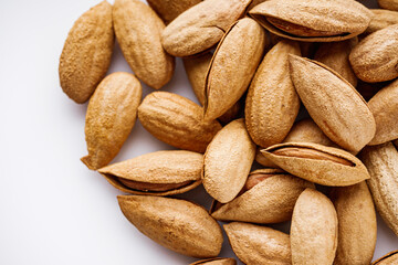 fresh almonds in shell on a white background