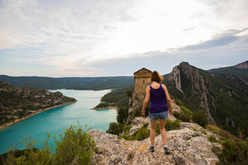 Fototapeta premium Young hiker girl enjoying in Congost De Montrebei, Montsec, Spain