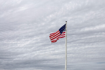 american flag against sky