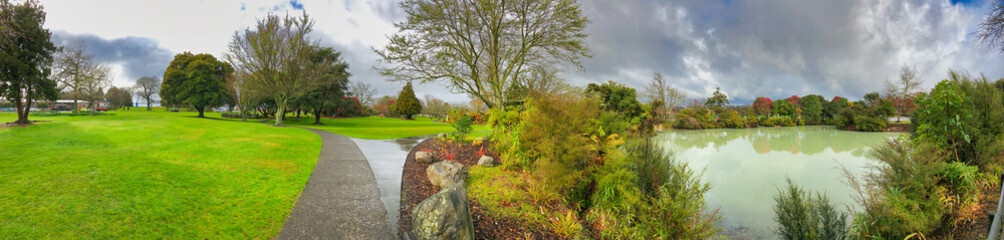 Kuirau Park on a rainy day in Rotorua, New Zealand. Panoramic view