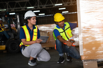 Warehouse employee worker with digital tablet talking on warehouse, Logistic industry concept.