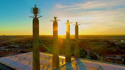 Aerial footage of tall buildings in Kansas City, Missouri in sunset sky background