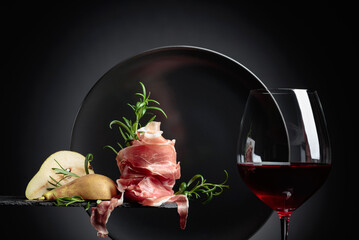 Red wine with prosciutto, pears and rosemary.
