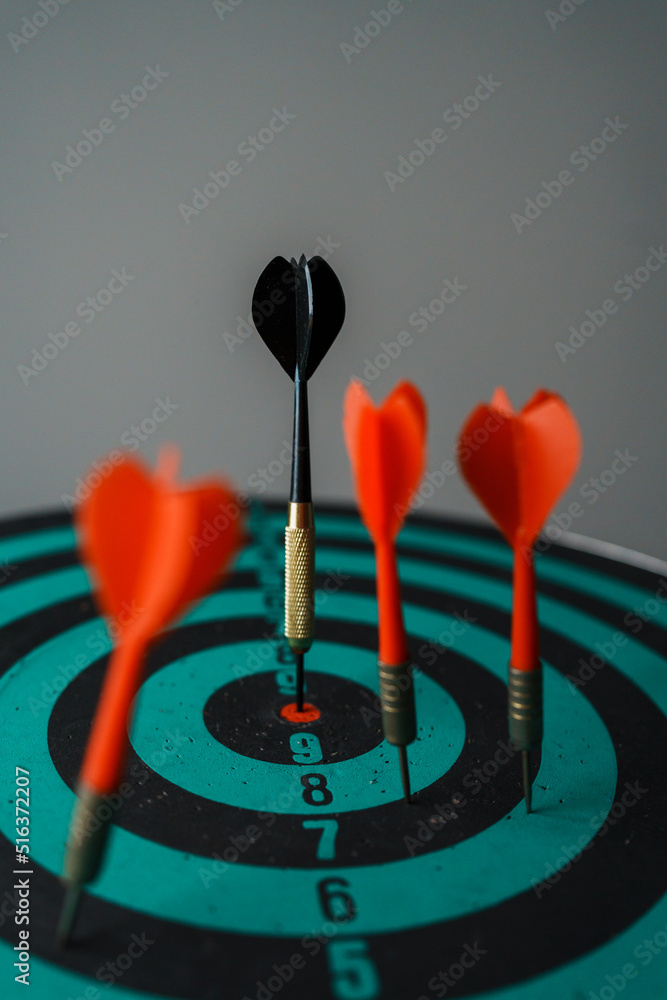 Poster bullseye is a target of business. dart is an opportunity and dartboard is the target and goal. so bo