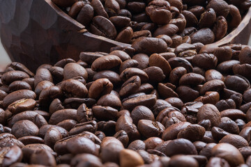 Coffee beans background. Shallow depth of field.