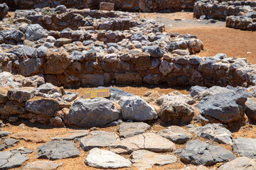 Ancient archaeological site in Crete with stone ruins