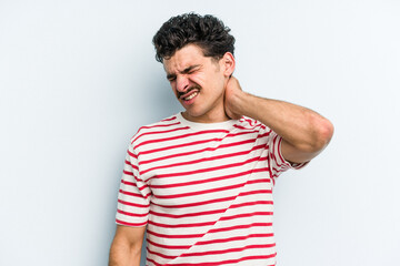 Obraz premium Young caucasian man isolated on blue background having a neck pain due to stress, massaging and touching it with hand.