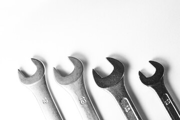 Mechanic's tools. Flat wrenches for loosening screws. Simple DIY tools. Close-up flat wrenches. Mechanical theme.