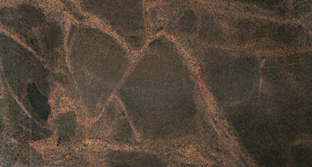 Dark grey stone texture with light red veins