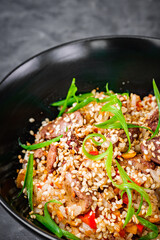 traditional chinese fried rice on black background