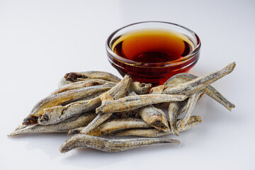 fragrant fish sauce on a white acrylic background