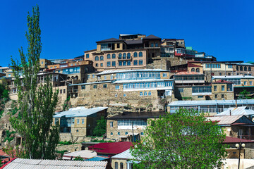traditional houses of highlanders on a mountainside in the ancient village of Chokh in Dagestan