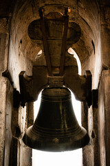 Obraz premium High contrast backlit vertical format frontal photograph of one of the bells cast in 1578 located in the Metropolitan Cathedral of Mexico City in the capital of Mexico.
