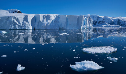 Antartic landscapes during a tripo across the Antartic peninsula with lot of icebergs, mountains...