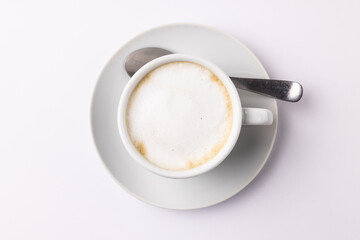 Image of white cup of coffee with milk on white background