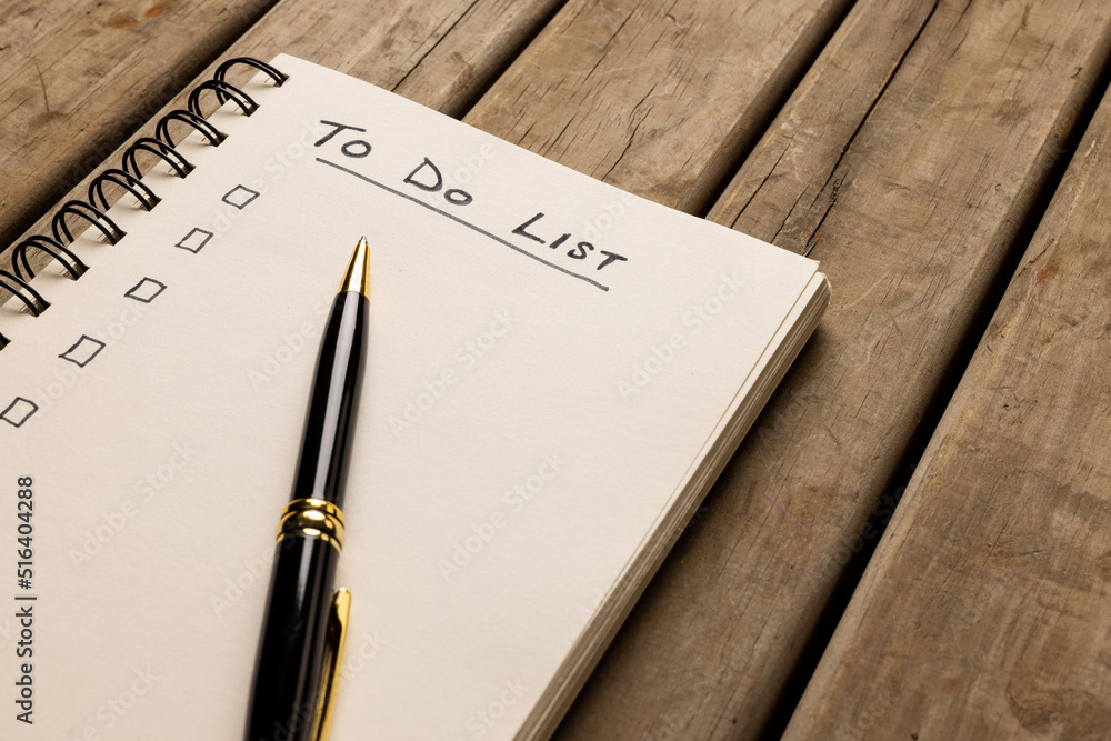 Aufkleber image of notebook with to do list and copy space on wooden surface with pen