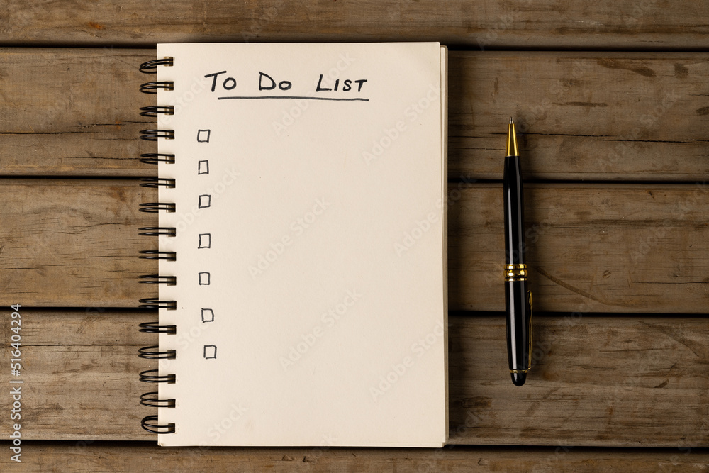 Aufkleber image of notebook with to do list and copy space on wooden surface with pen