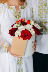 bride and groom holding wedding bouquet