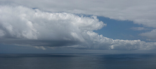 Cloudscape. Blue. Sea. Horizon over sea. Weather 