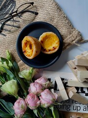 pie on a wooden table with flowers