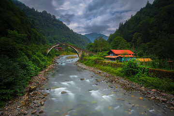 Old stone bridges and people passing by