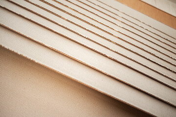 Corrugated cardboard for packing. abstract background horizontal lines with wavy lines of beige color