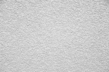 Texture of white plaster wall as background
